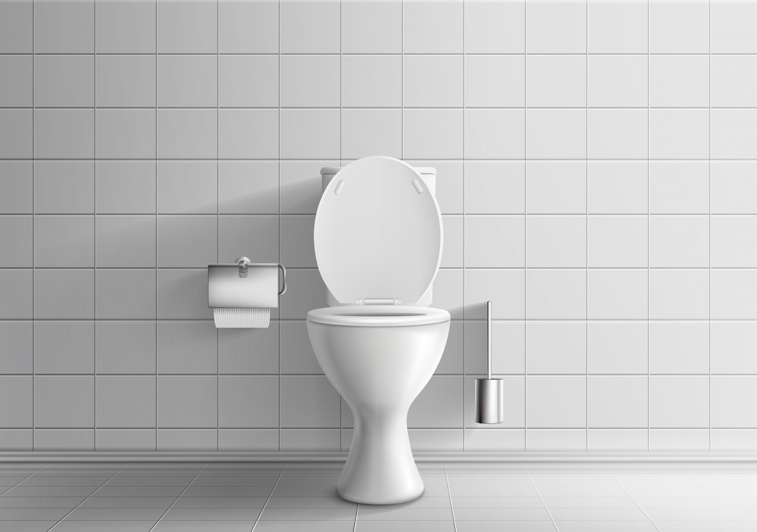 A clean white toilet against a tiled wall